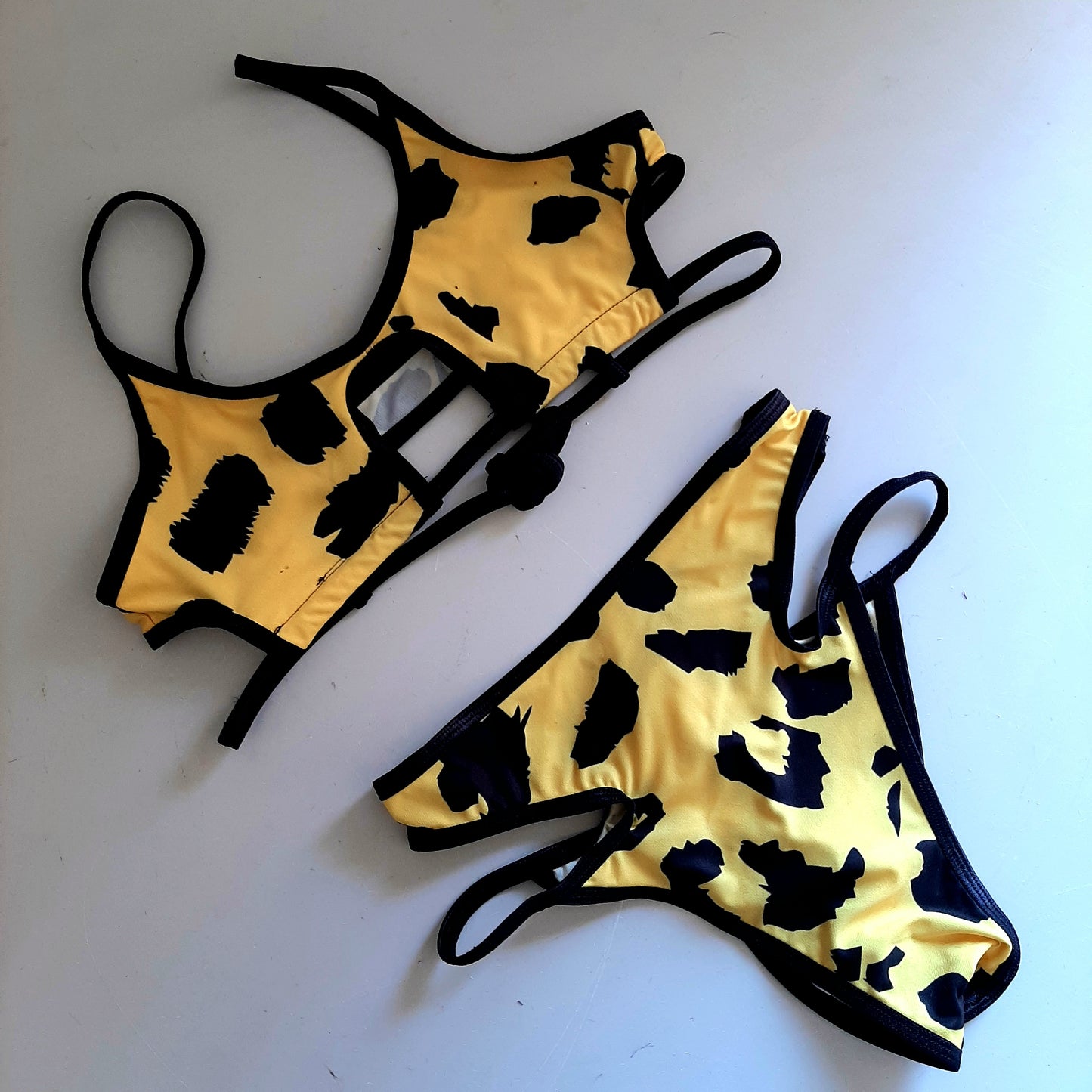 Completo summer cutout flintstone/nero - Flamingo pole wear