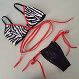 Completo bikini slip coco laccetti zebra rosso
