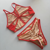 Flesh 040 / red lycra suit